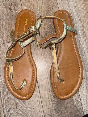BCBGeneration Metallic Gold T-Strap Sandals with Tan Footbed